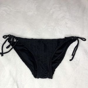 Repaired Black Hole Bikini Bottoms. Youth Size: Small.